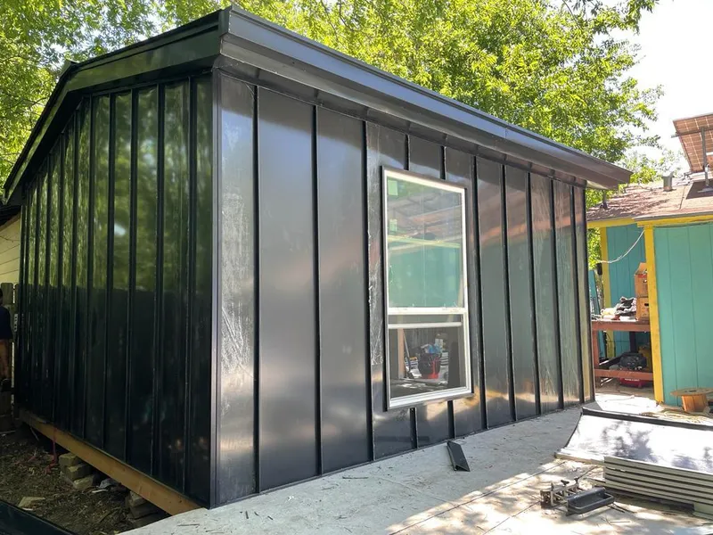 Black standing seam metal wall panels for Metal Roof Installation in Oatfield