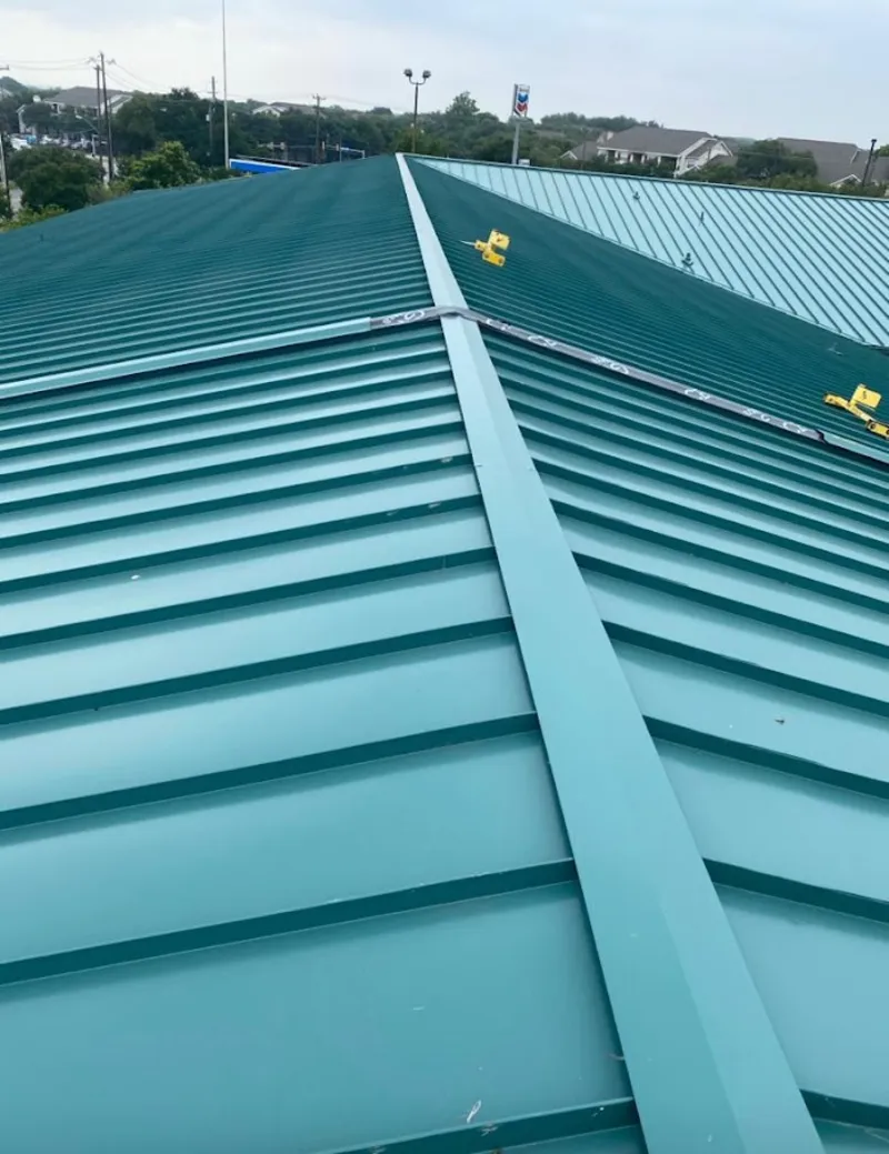 Green commercial metal roof ridge and valley for Metal Roof Repair in Oatfield